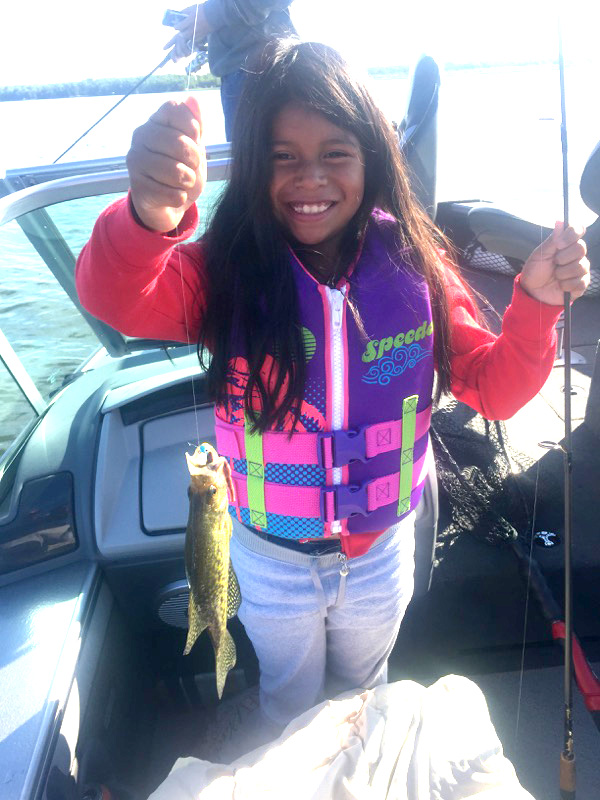 Remington Fishing Guide with young walleye fishergal
