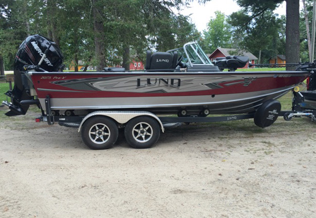 Remington Fishing Guide Service current Lund 1975 Pro-V boat